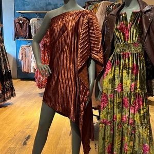 Anthropologie. Dress. Mid length. Asymmetrical cut.